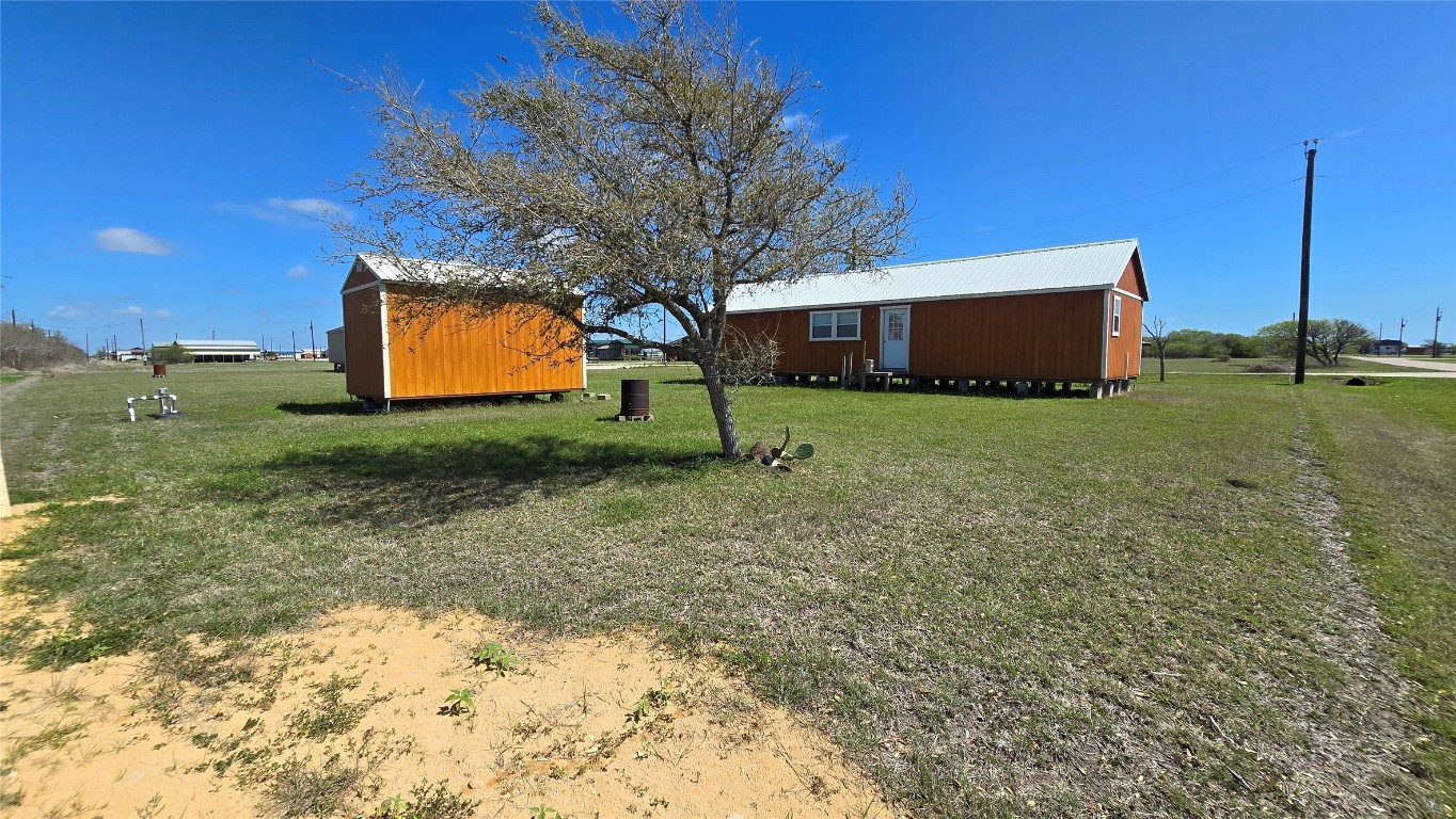 354 Haddock Palacios, TX 77465 - Photo 8 of 21 a view of a backyard with large trees
