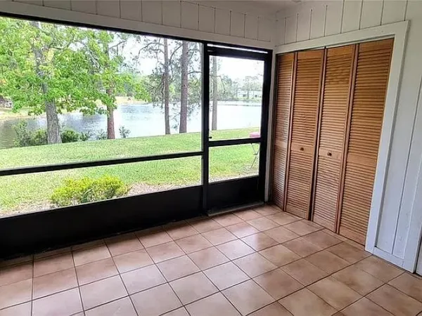 a view of balcony with furniture