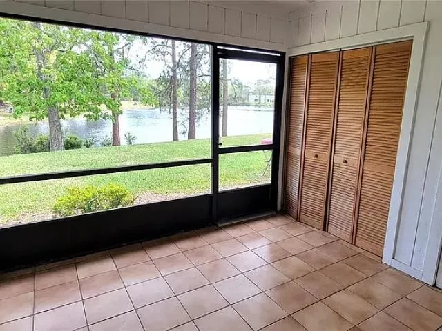 a view of balcony with furniture