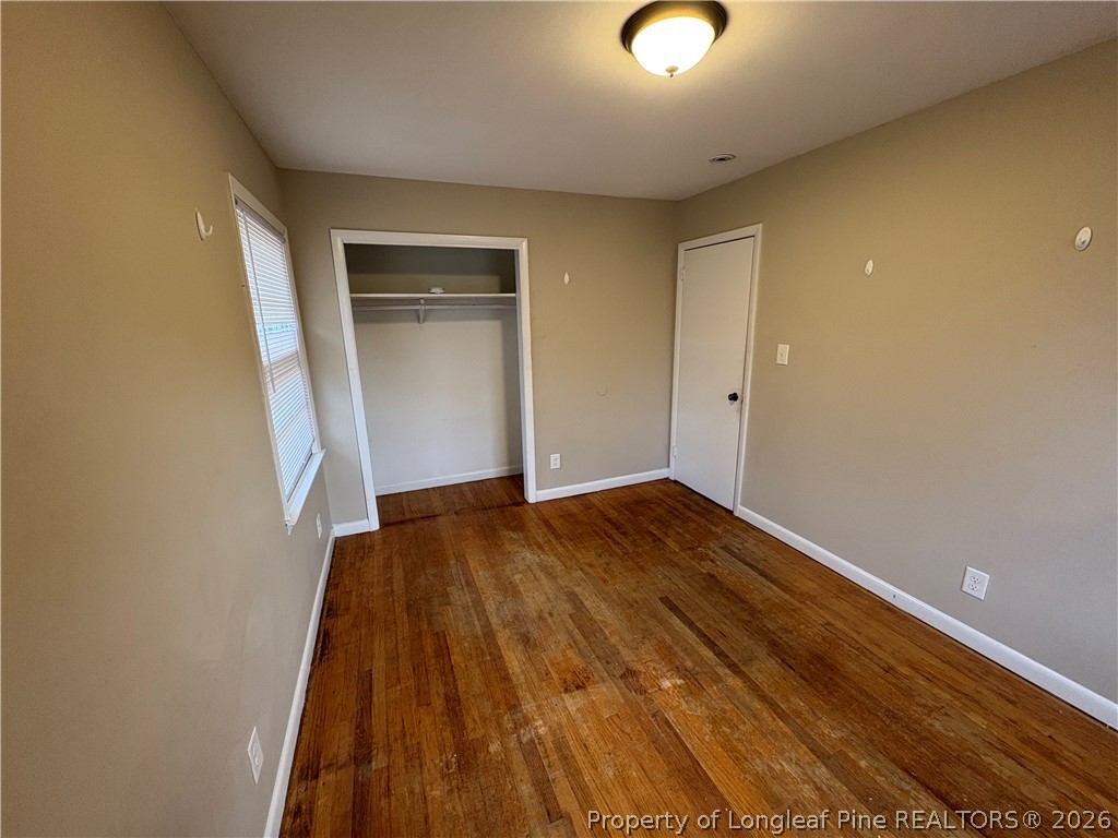 440 North Grogg Street Spring Lake, NC 28390 - Photo 17 of 23 a view of empty room with wooden floor