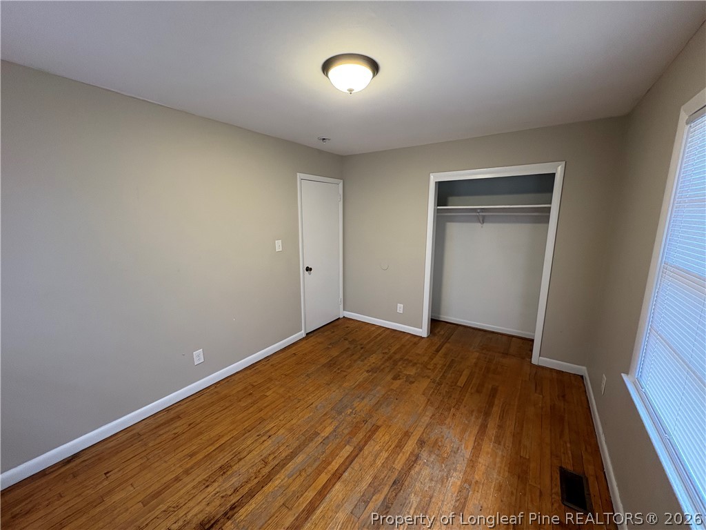440 North Grogg Street Spring Lake, NC 28390 - Photo 19 of 23 a view of room with wooden floor