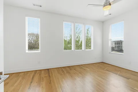 a view of balcony with furniture