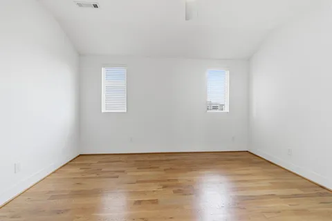 a view of outdoor space with wooden floor