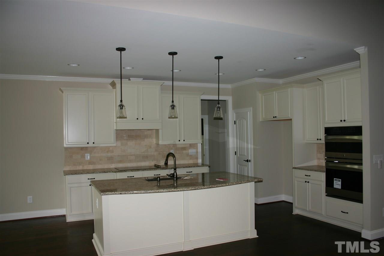 1101 Narron Farm Road Zebulon, NC 27597 - Photo 8 of 16 Large kitchen with granite and SS appliances