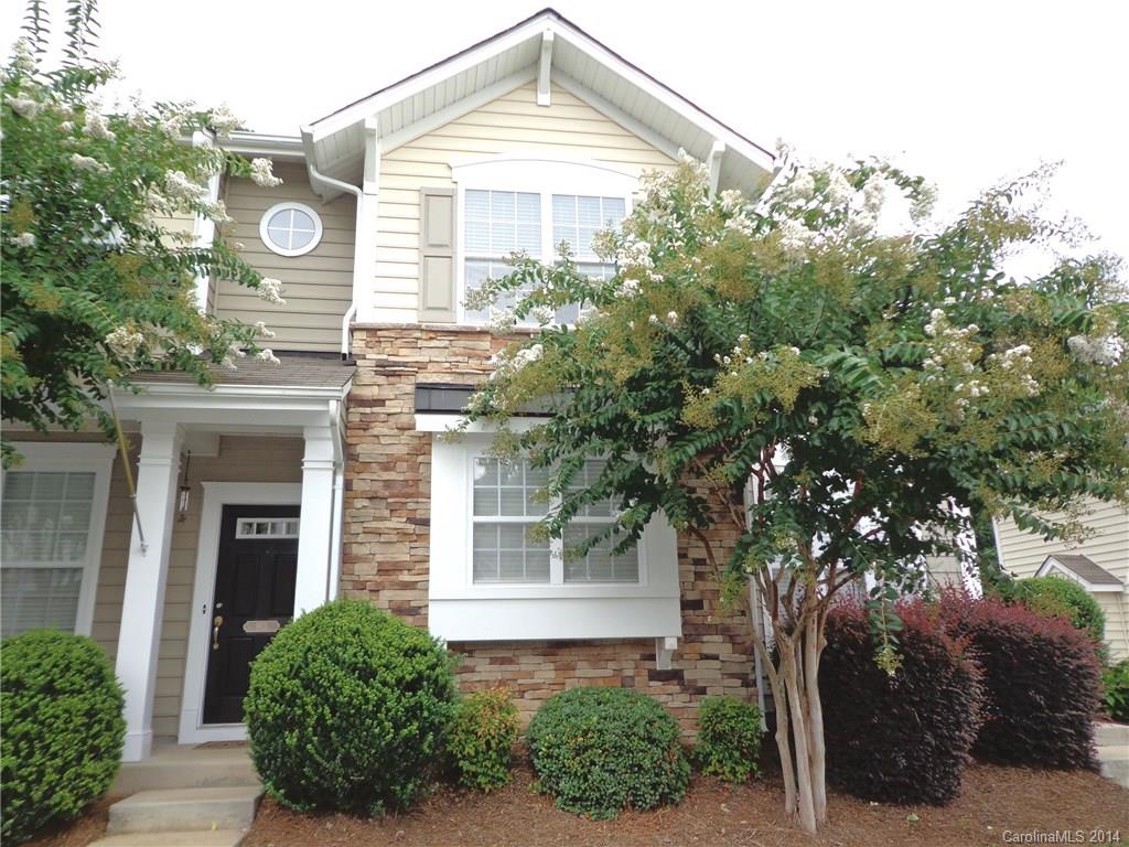 913 Copperstone Lane, Unit 188 Fort Mill, SC 29708 - Photo 1 of 24 a front view of a house with yard