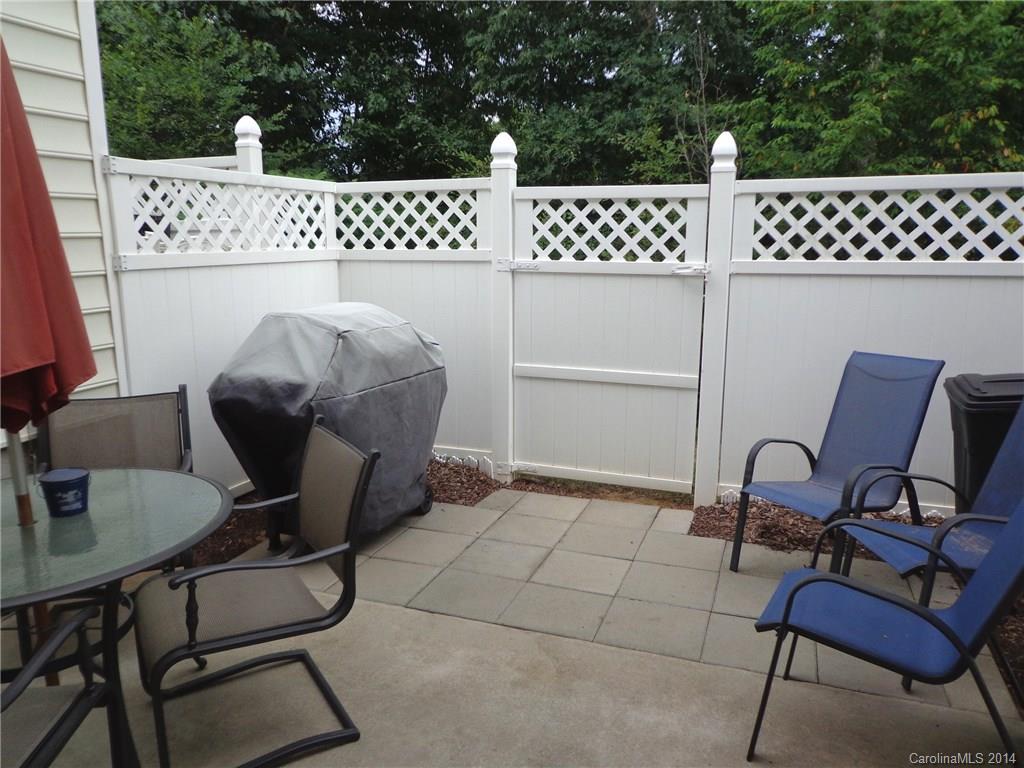 913 Copperstone Lane, Unit 188 Fort Mill, SC 29708 - Photo 22 of 24 a balcony with table and chairs
