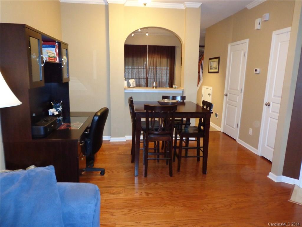913 Copperstone Lane, Unit 188 Fort Mill, SC 29708 - Photo 7 of 24 a view of a dining room with furniture