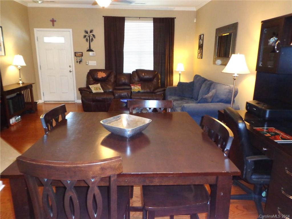 913 Copperstone Lane, Unit 188 Fort Mill, SC 29708 - Photo 10 of 24 a living room with furniture and a flat screen tv