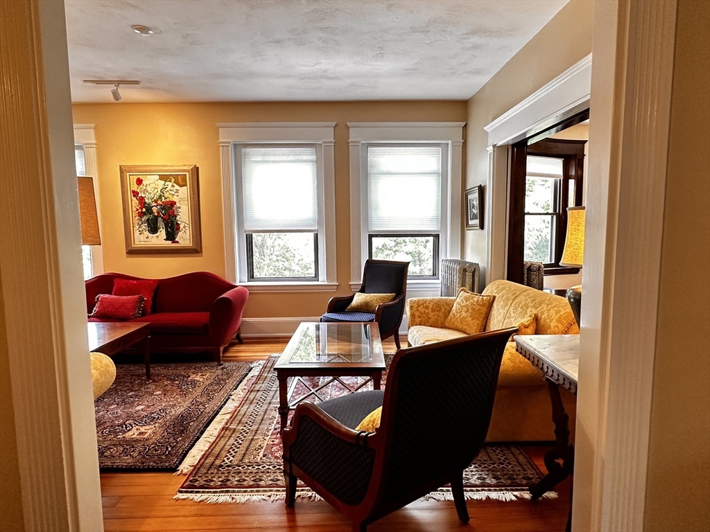 24 Beaufort Road, Unit 3 Boston, MA 02130 - Photo 22 of 25 a living room with furniture and a window