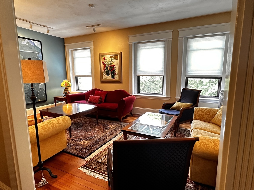24 Beaufort Road, Unit 3 Boston, MA 02130 - Photo 6 of 25 a living room with furniture and a window