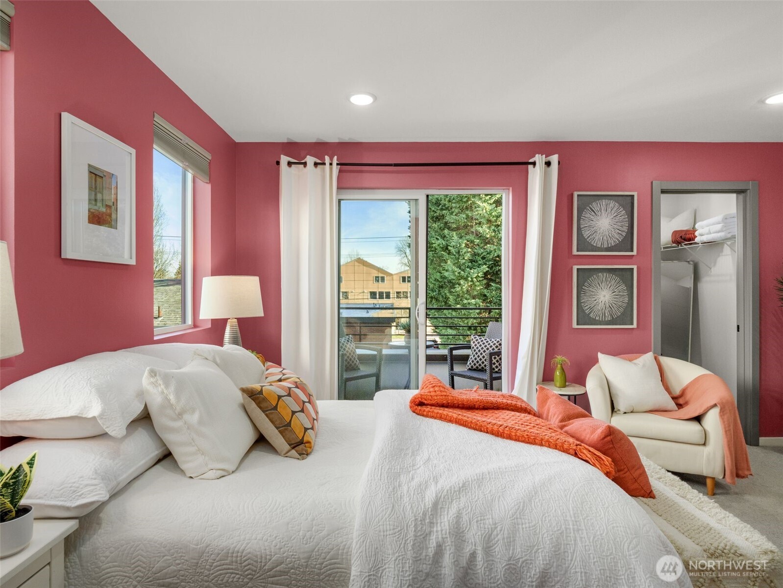 541 South Cloverdale Street, Unit B Seattle, WA 98108 - Photo 19 of 29 a bedroom with a bed and glass window