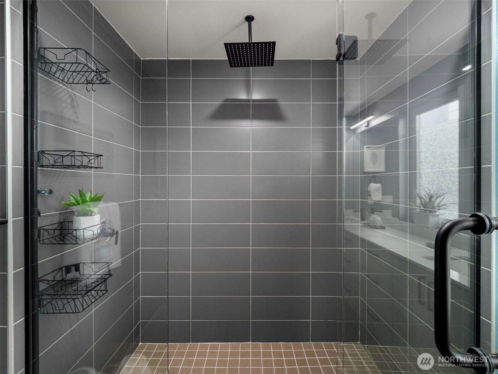 541 South Cloverdale Street, Unit B Seattle, WA 98108 - Photo 21 of 29 a bathroom with a shower