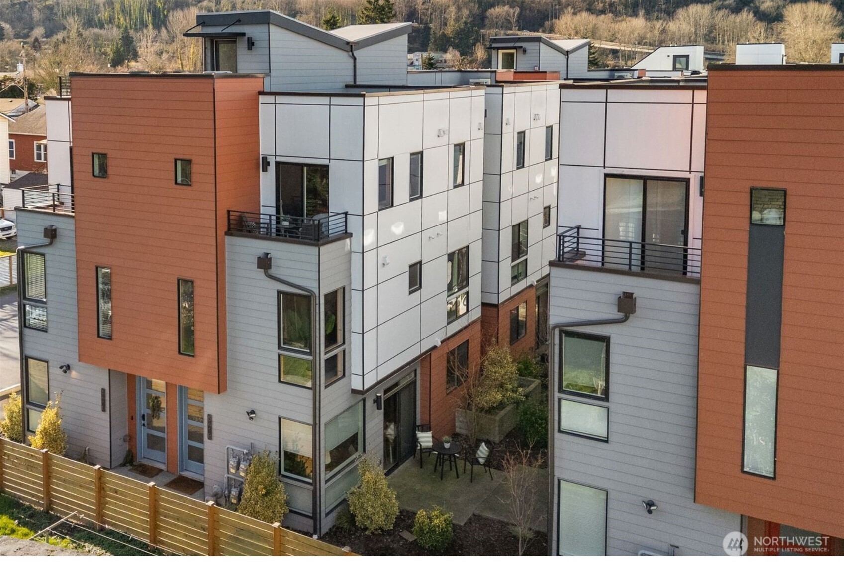 541 South Cloverdale Street, Unit B Seattle, WA 98108 - Photo 3 of 29 a view of a building with a outdoor space