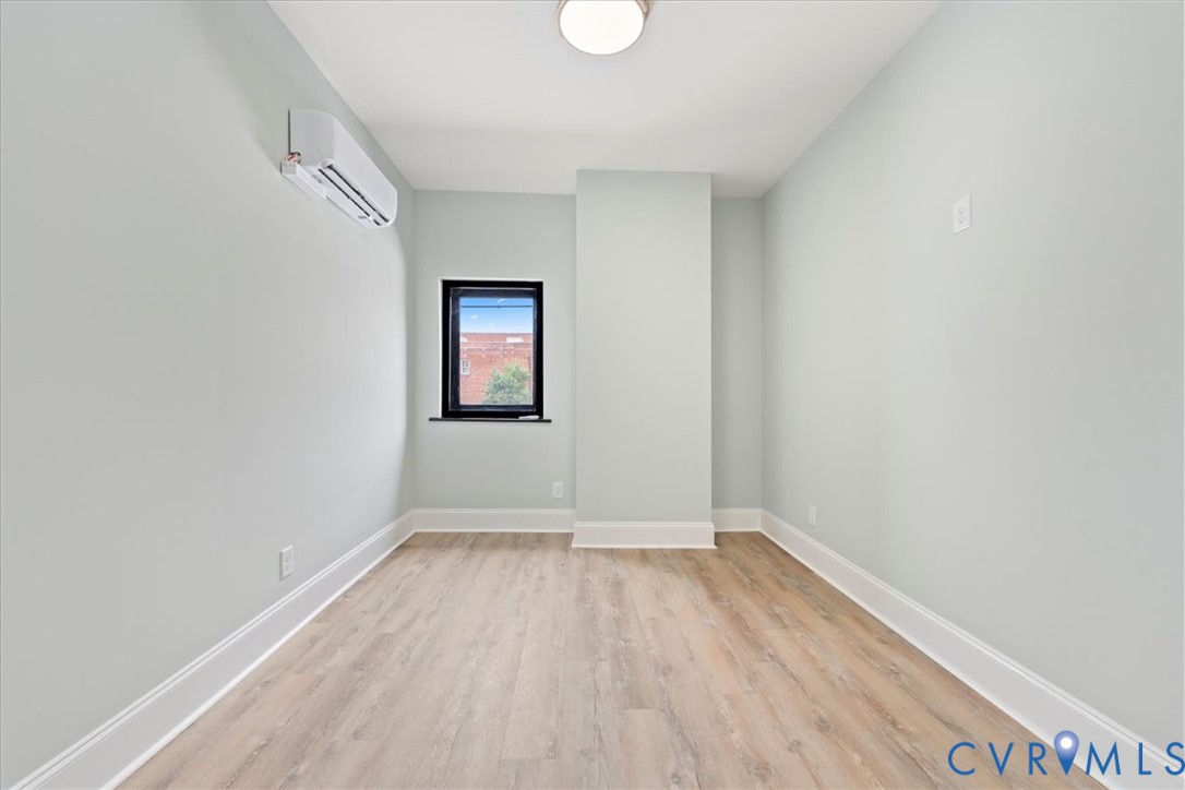 207 East Broadway, Unit B Hopewell, VA 23860 - Photo 1 of 27 wooden floor in an empty room