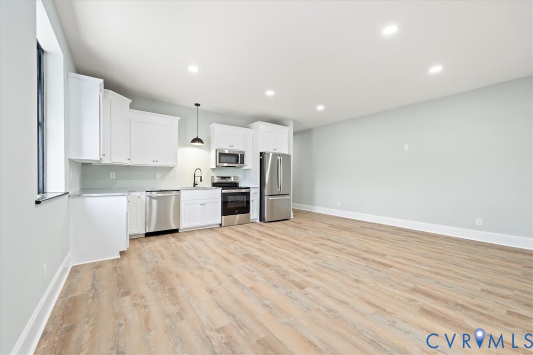 207 East Broadway, Unit B Hopewell, VA 23860 - Photo 12 of 27 a view of kitchen with stainless steel appliances refrigerator oven and cabinets
