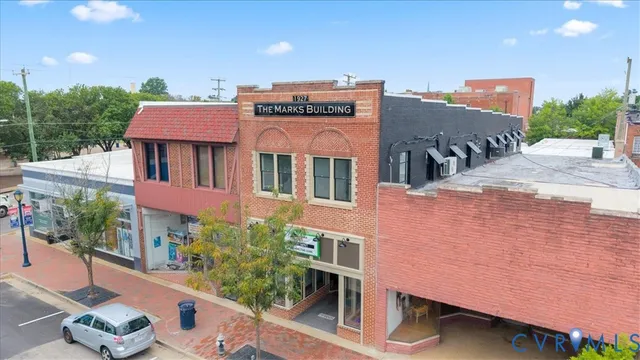 a front view of a building with balcony