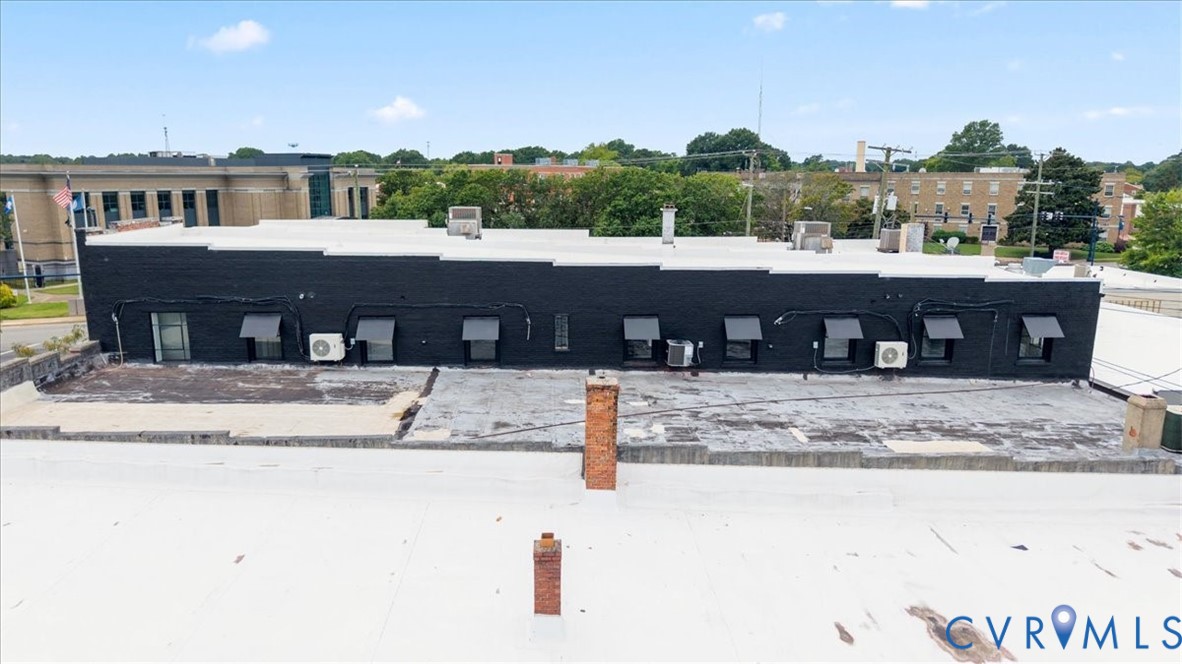 207 East Broadway, Unit B Hopewell, VA 23860 - Photo 25 of 27 a view of a house with a yard