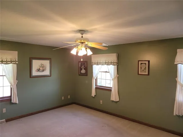 en empty room with windows