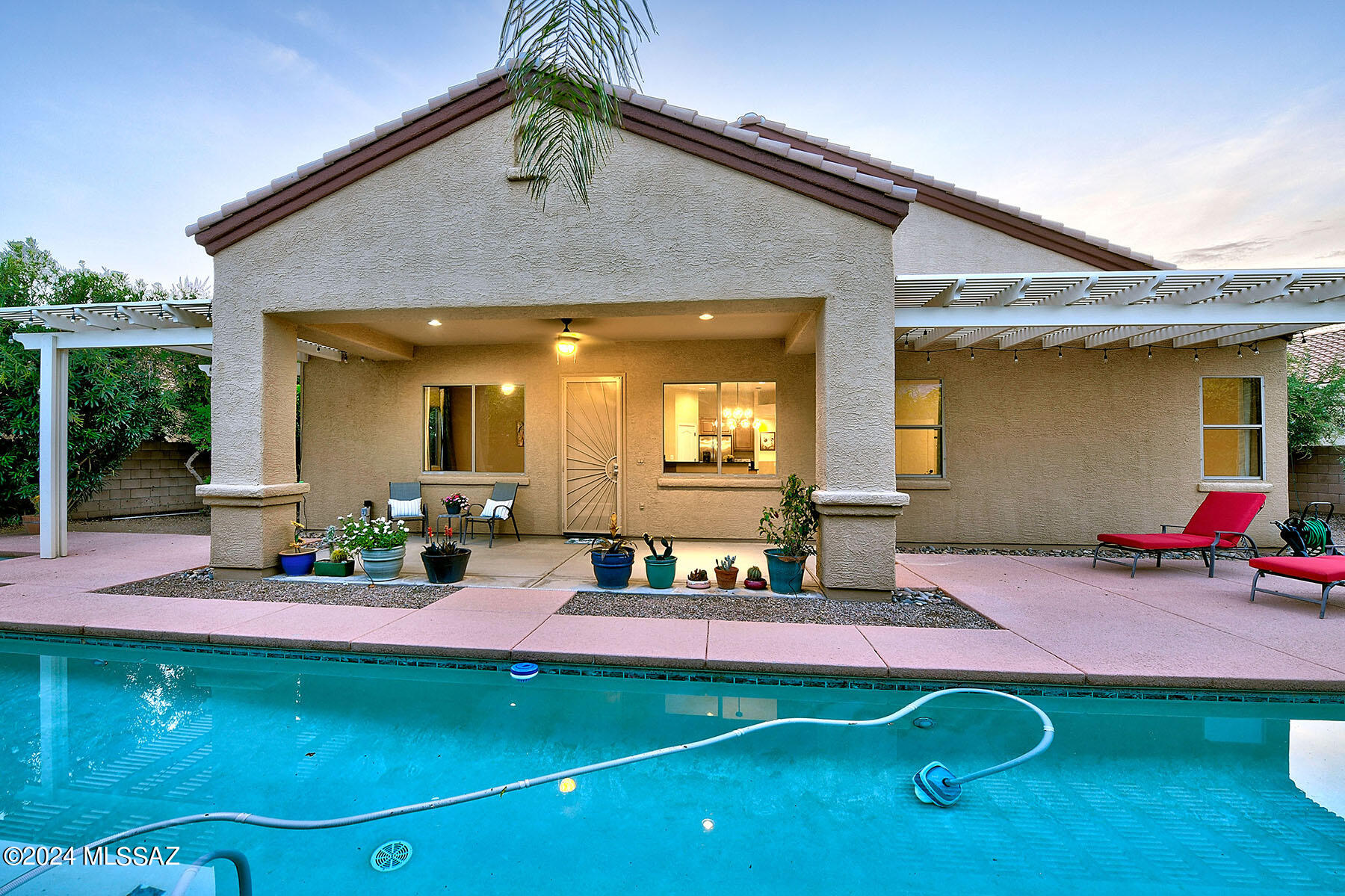 15084 North Pelham Road Tucson, AZ 85739 - Photo 35 of 40 a house view with a outdoor seating space