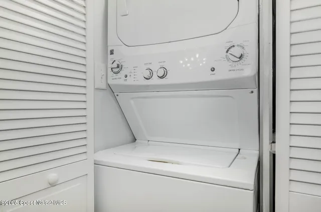 a close up view of washer and dryer