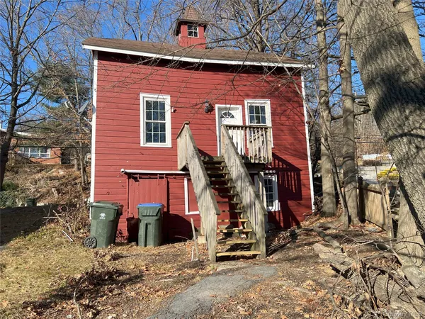 front view of a house with an outdoor space