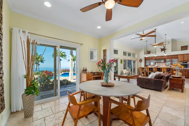 a dining room with furniture and window