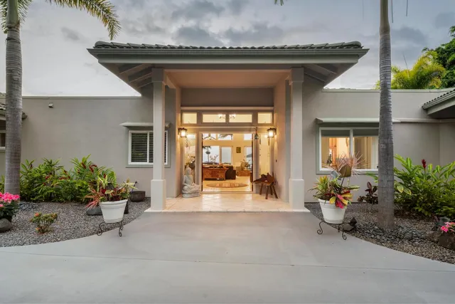 a view of an ocean and a yard