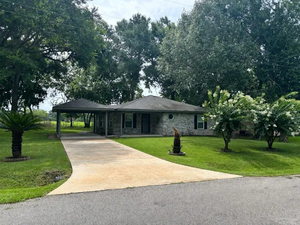 a view of outdoor space with yard and green space