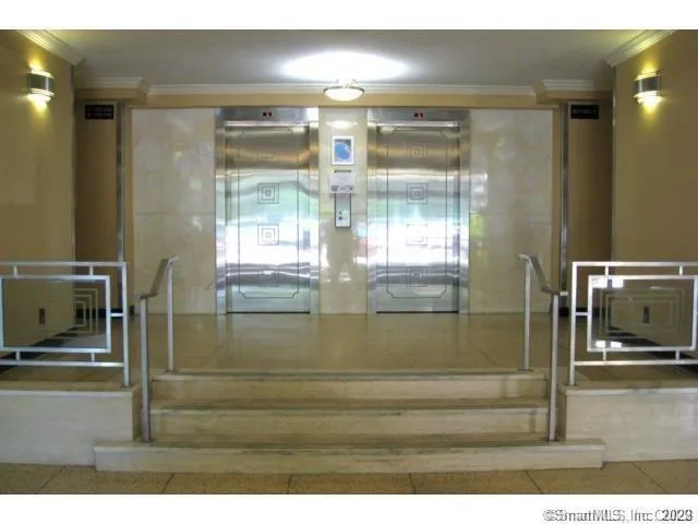 a kitchen with a window a sink and a stove
