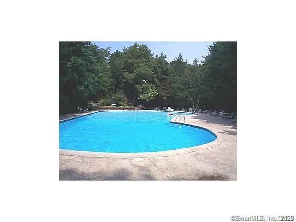 a view of balcony with furniture