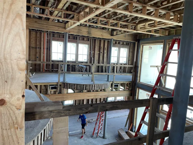 a view of a balcony with furniture