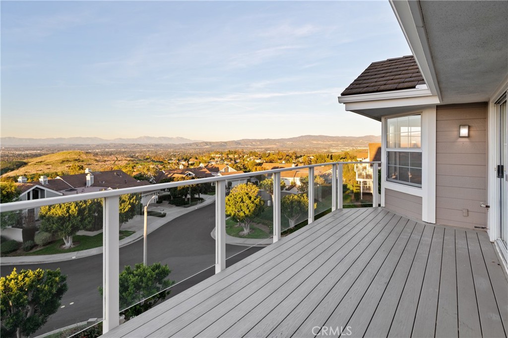 6 Saros, Unit 68 Irvine, CA 92603 - Photo 14 of 35 a view of a balcony with wooden floor and city view