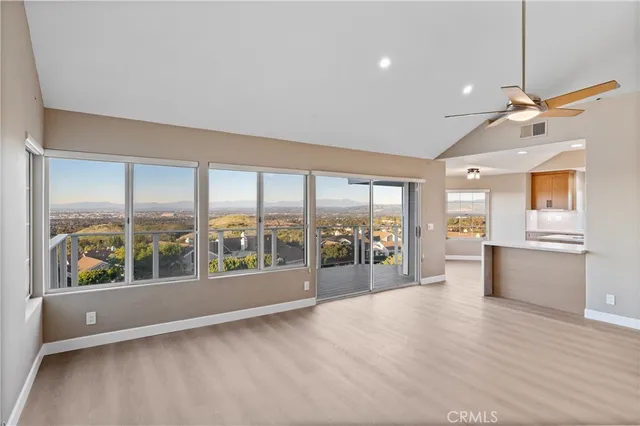 a kitchen that has a sink and a stove