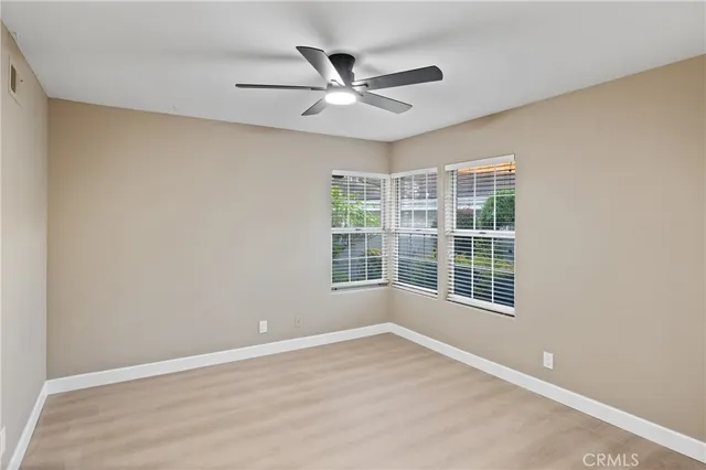 a view of an empty room and stairs