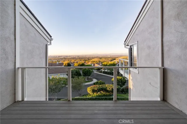 wooden floor in an empty room with a fireplace