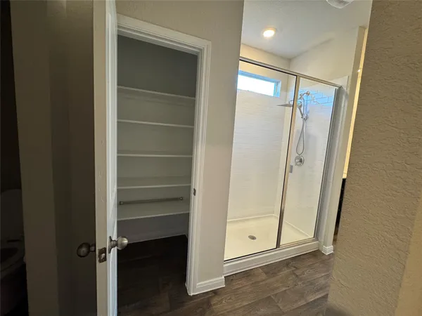 a bathroom with a double vanity sink and mirror