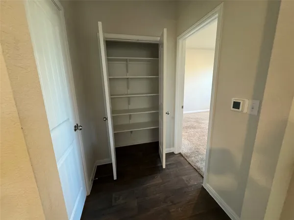 a kitchen with a refrigerator stove and microwave