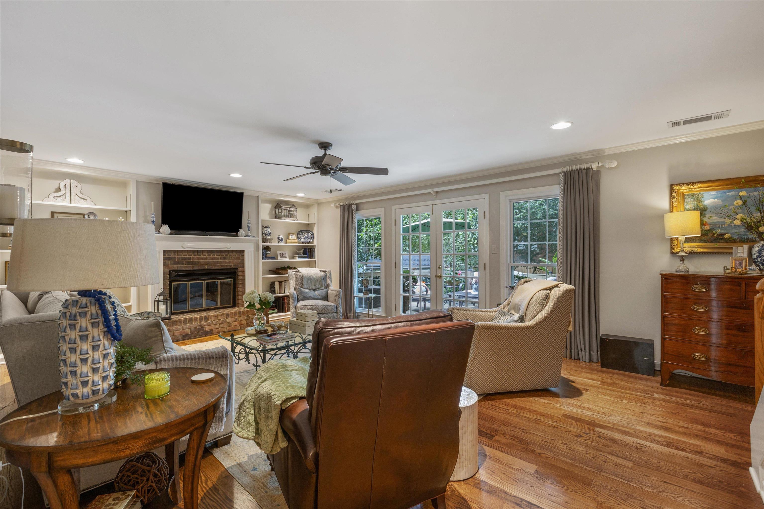 560 Silverman Drive Collierville, TN 38017 - Photo 11 of 31 a living room with fireplace furniture and a flat screen tv