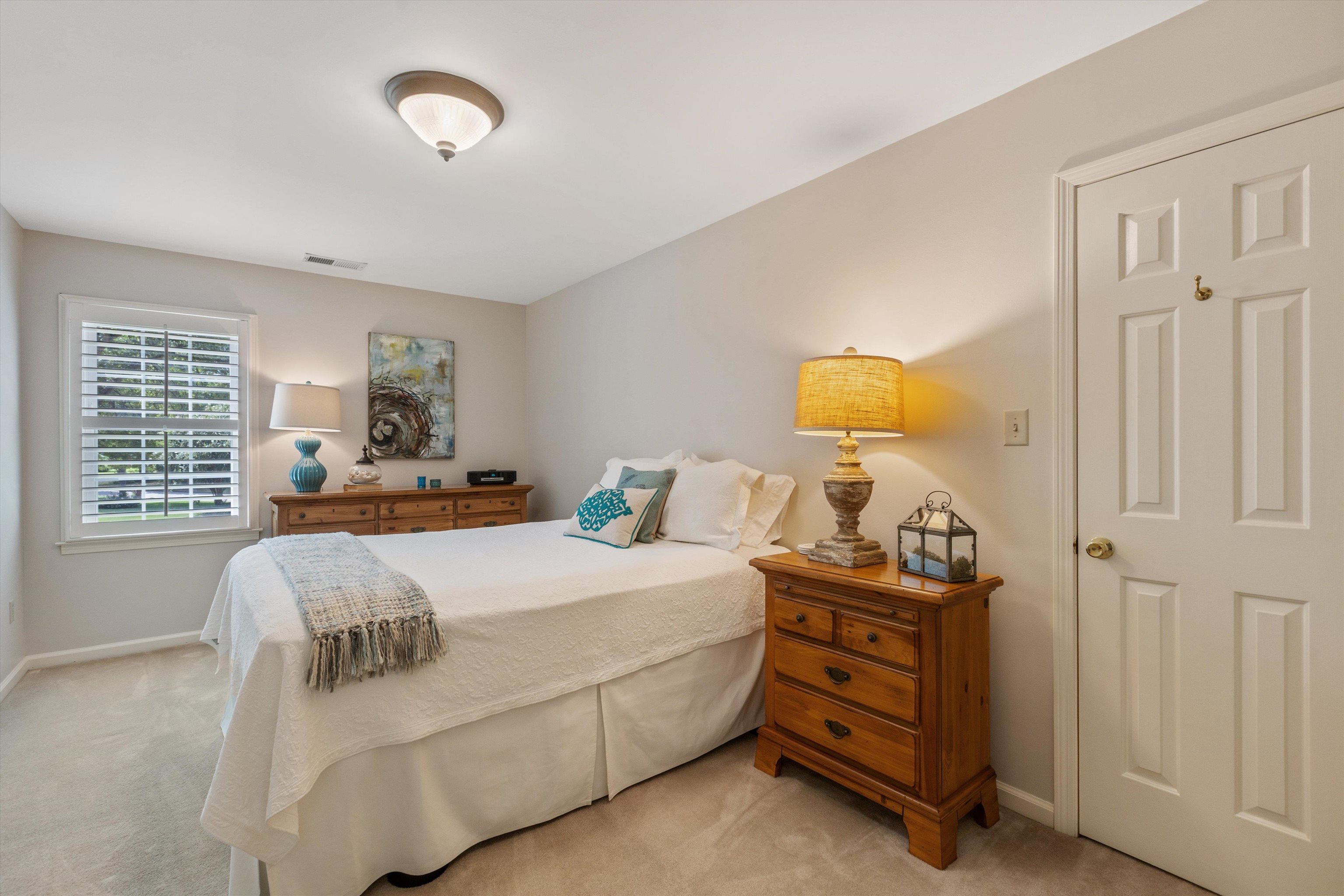 560 Silverman Drive Collierville, TN 38017 - Photo 19 of 31 a bedroom with a bed and a window