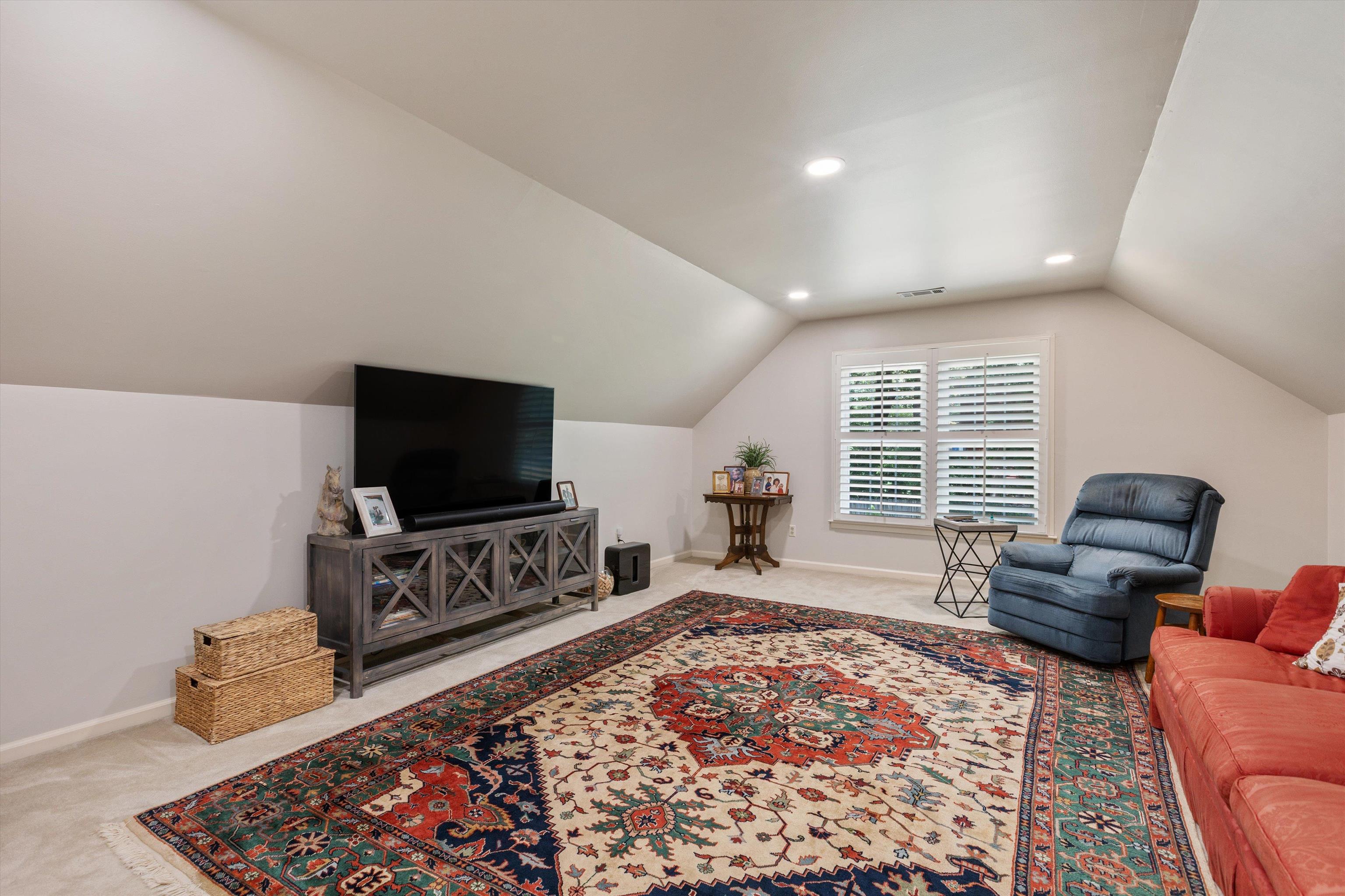 560 Silverman Drive Collierville, TN 38017 - Photo 23 of 31 a living room with furniture and a flat screen tv