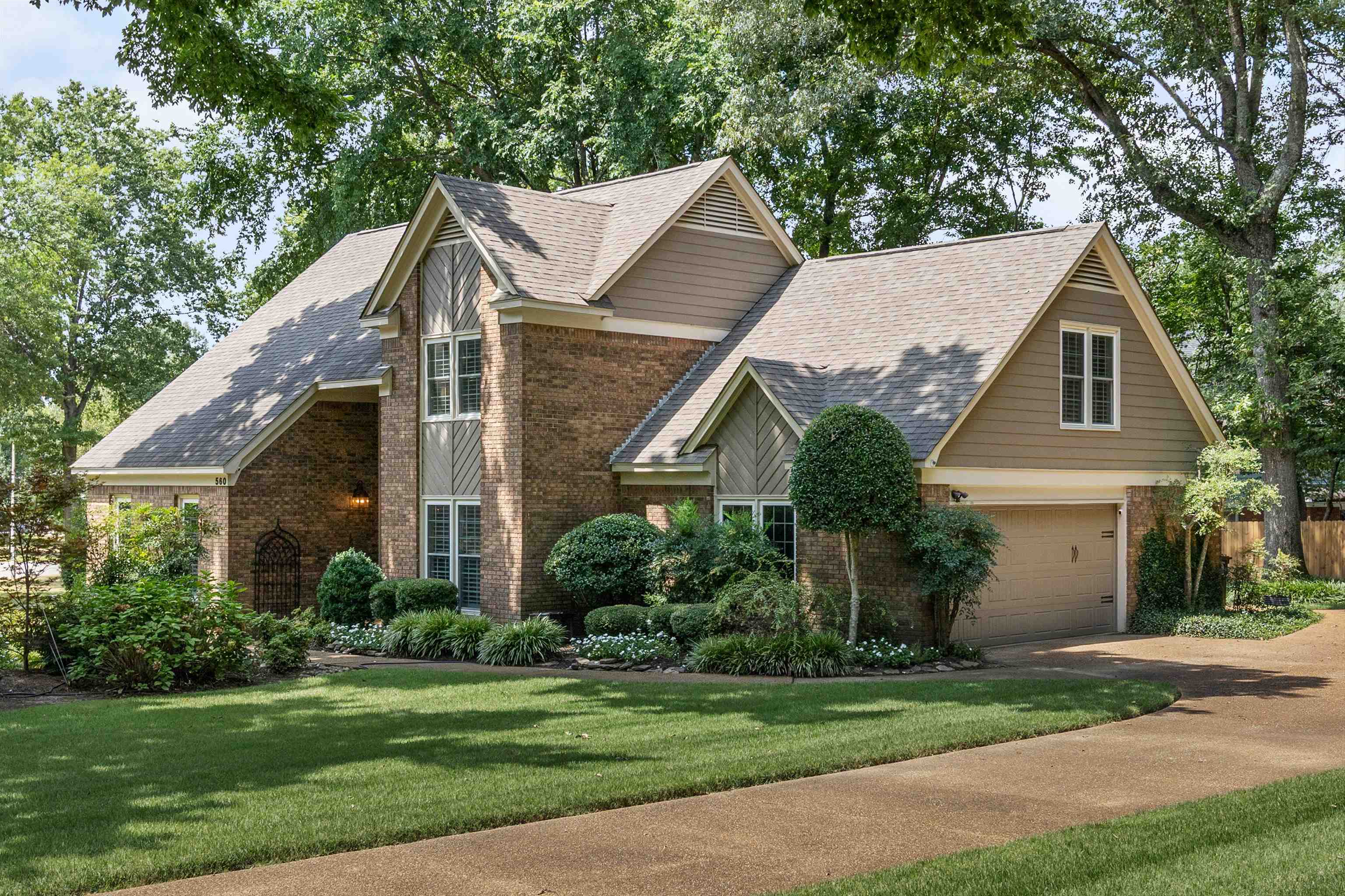 560 Silverman Drive Collierville, TN 38017 - Photo 27 of 31 a aerial view of a house next to a yard