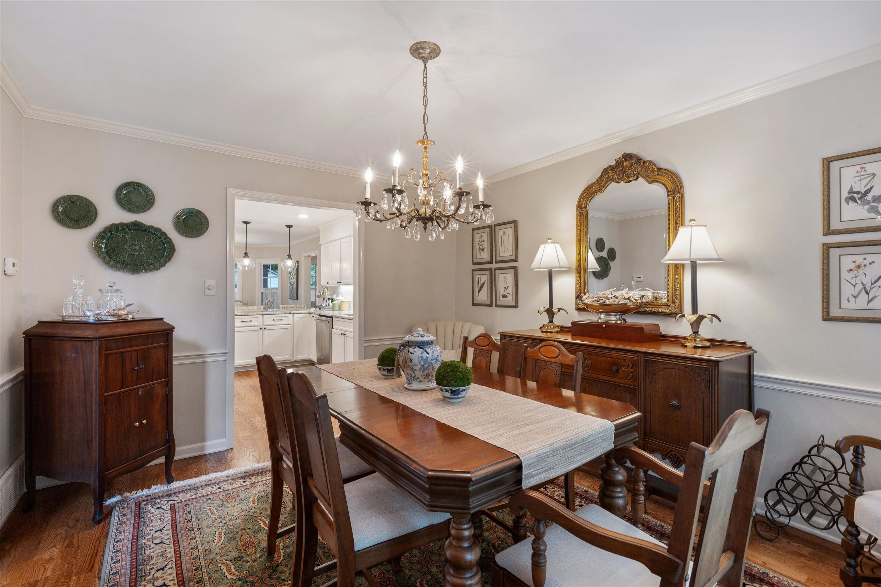 560 Silverman Drive Collierville, TN 38017 - Photo 4 of 31 a view of a dining room with furniture and chandelier