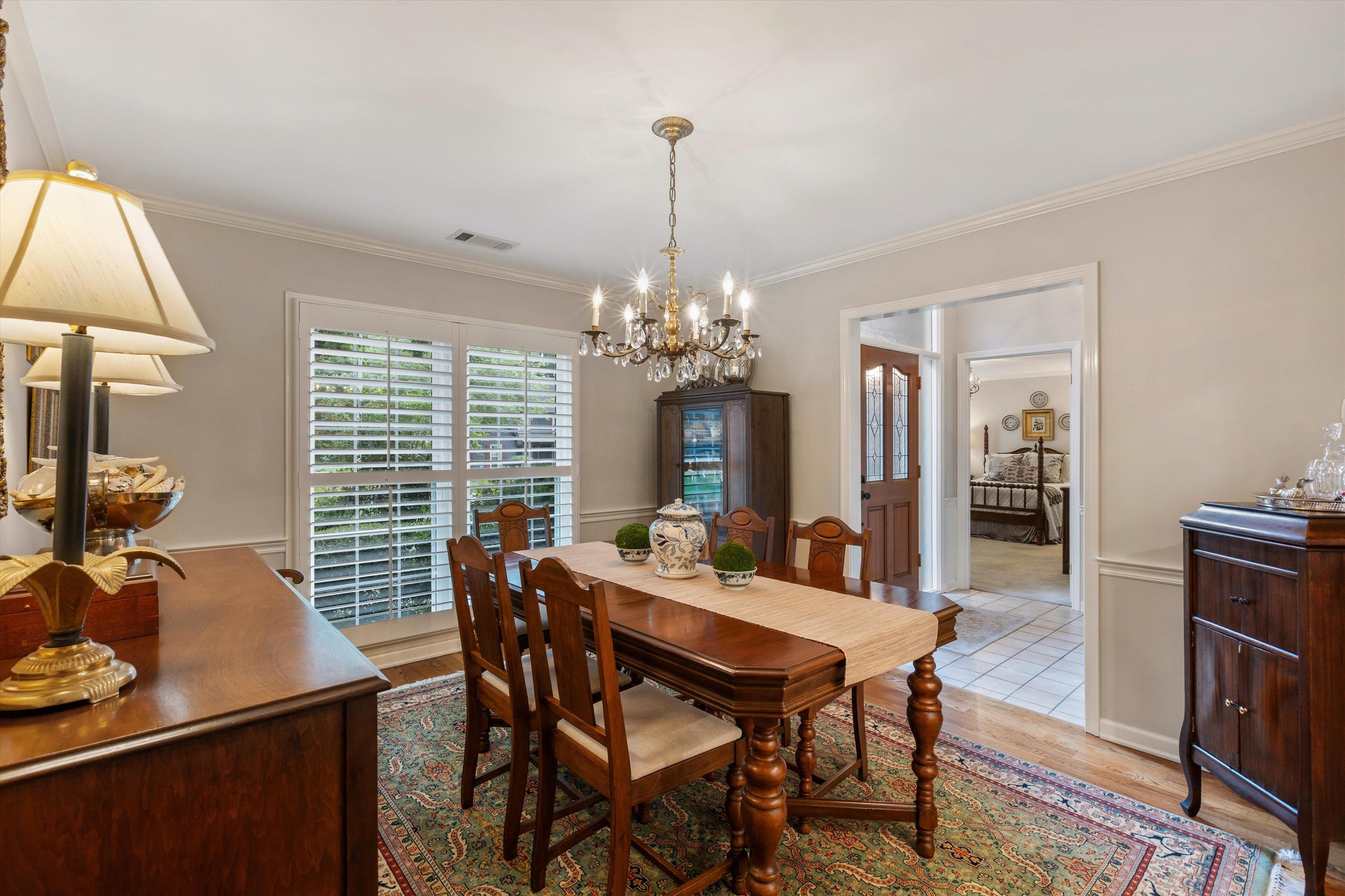 560 Silverman Drive Collierville, TN 38017 - Photo 5 of 31 a view of a dining room with furniture window and wooden floor