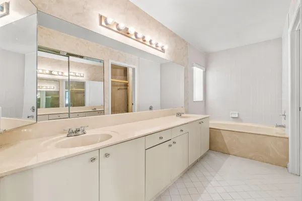 a bathroom with a shower and toilet