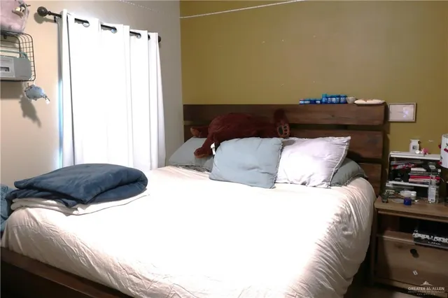 a work room with furniture and wooden floor