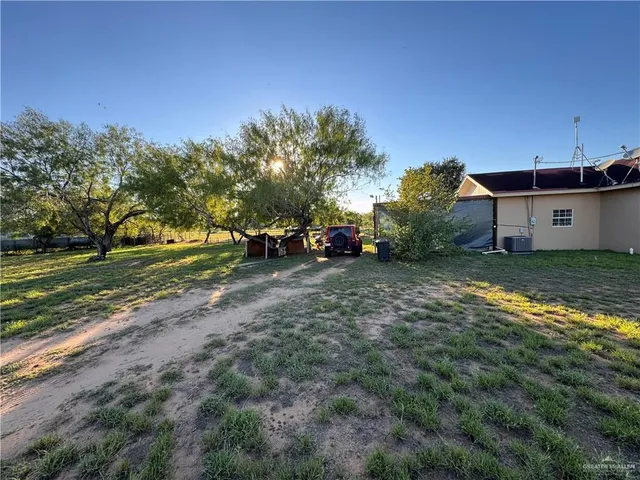 a fire hydrant in the middle of a field