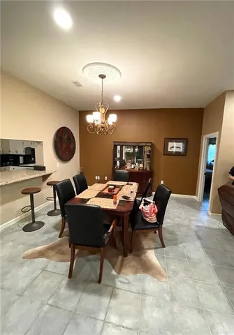 a bedroom with a bed and a table in it