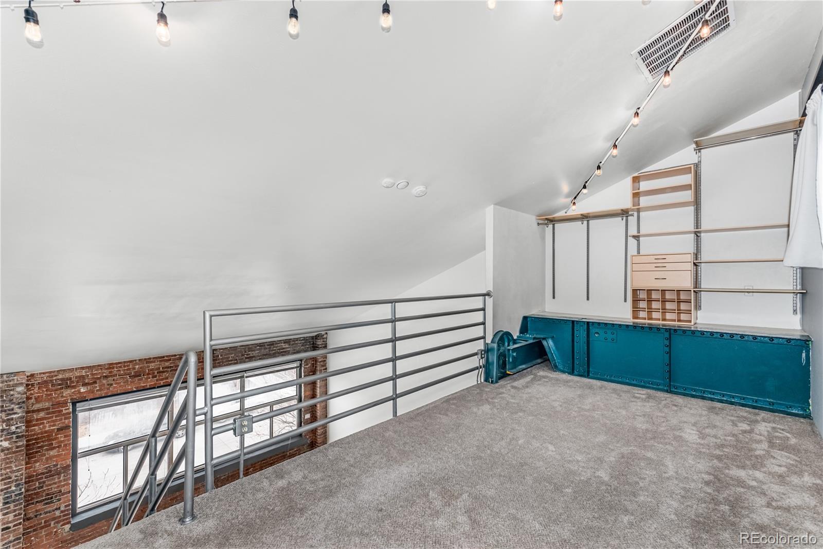 3309 Blake Street, Unit 207 Denver, CO 80205 - Photo 11 of 26 a view of entryway with stairs