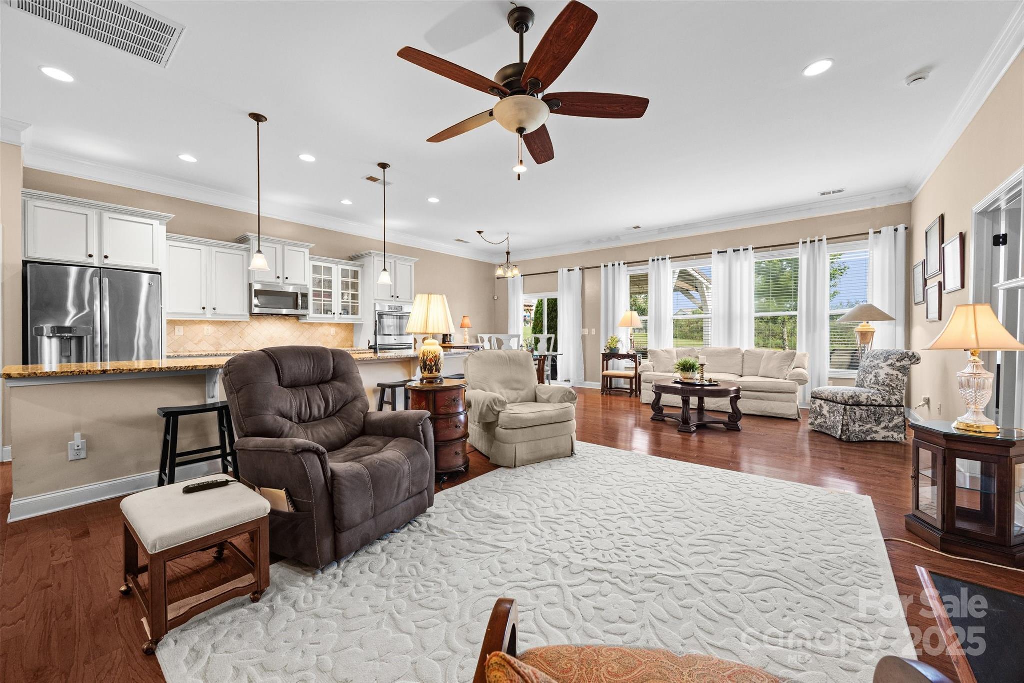 1617 Fig Branch Road Clover, SC 29710 - Photo 11 of 33 a living room with furniture ceiling fan and a rug