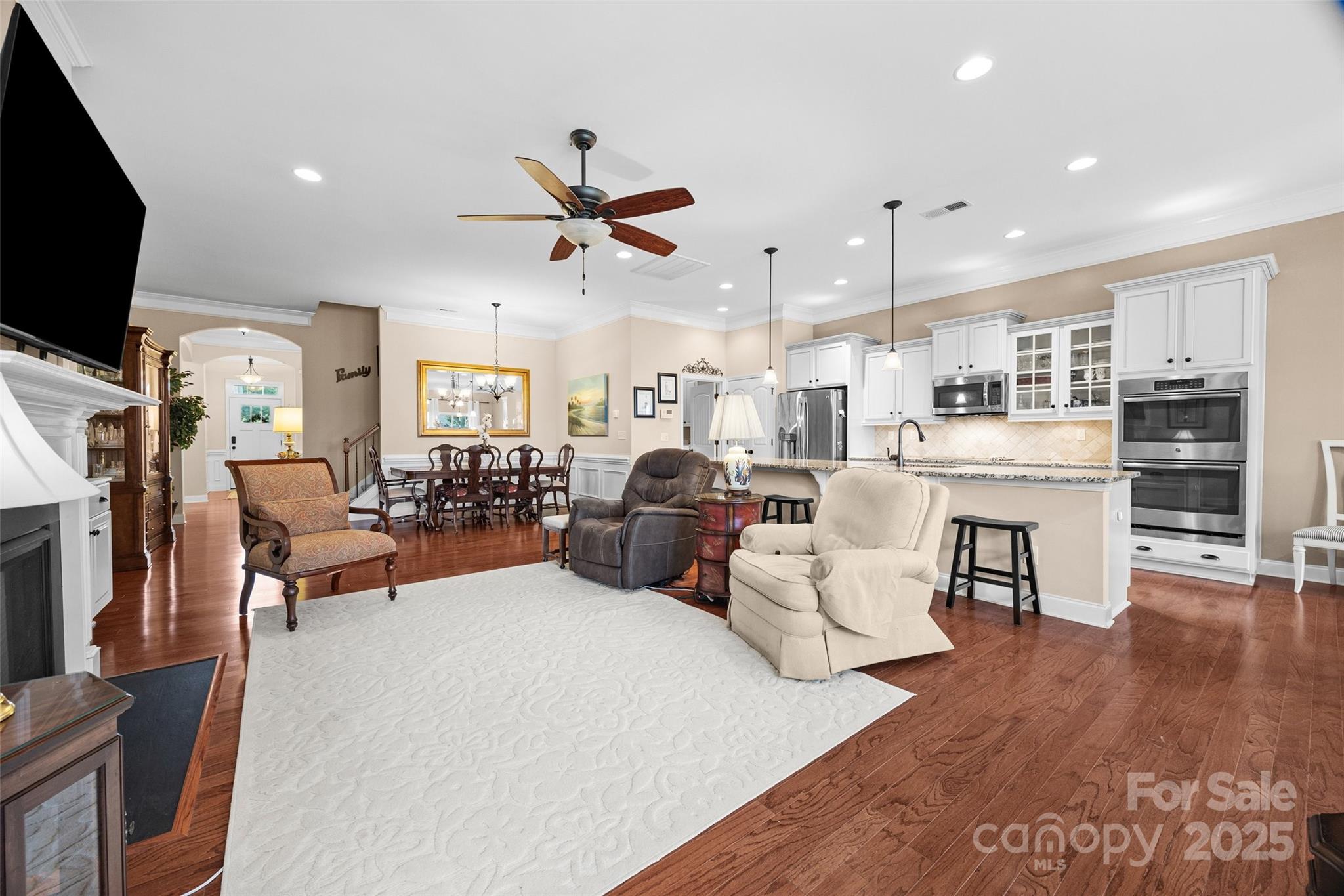 1617 Fig Branch Road Clover, SC 29710 - Photo 12 of 33 a living room with furniture kitchen view and a flat screen tv